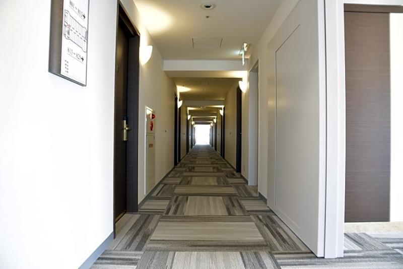 Hotel Port Plaza Chiba Exterior foto A typical hotel corridor